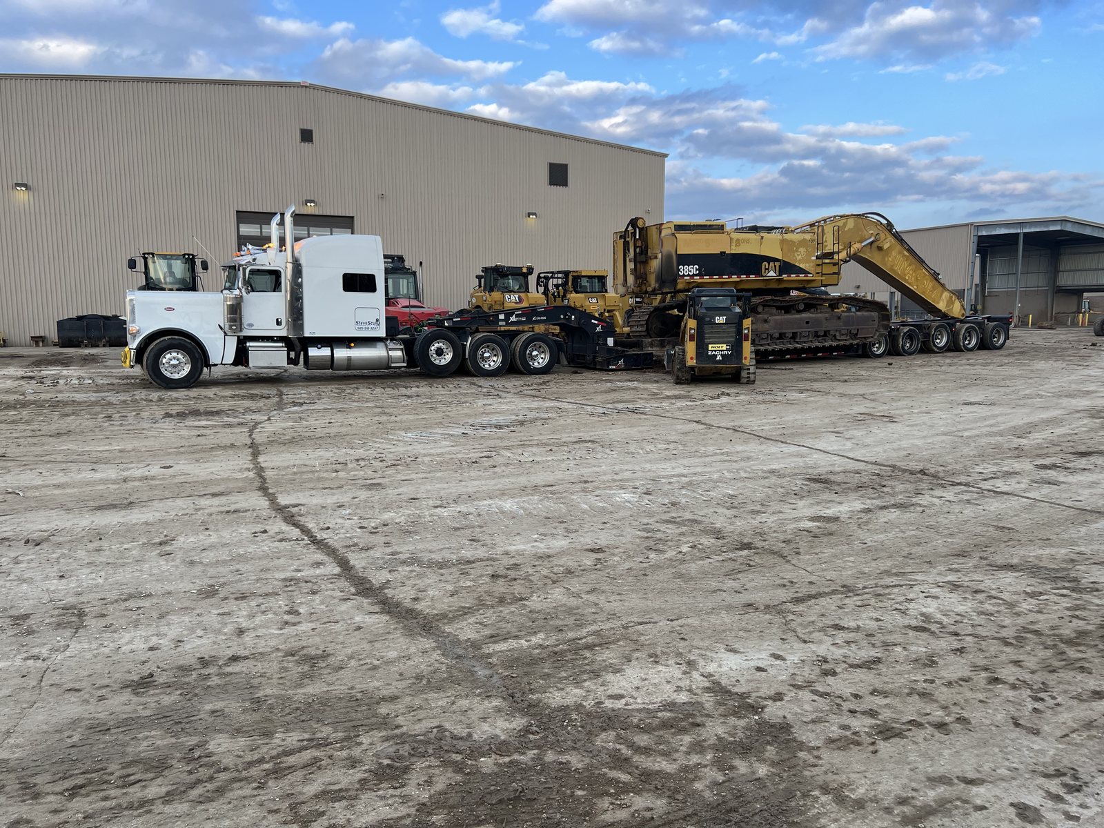 Large Excavator RGN Loading